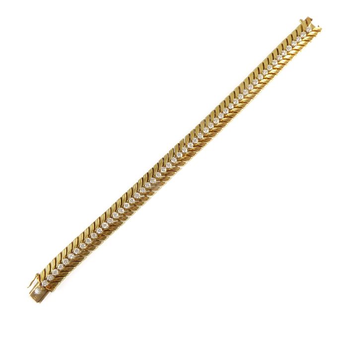 Gold and diamond set chevron strap bracelet by Cartier, | MasterArt